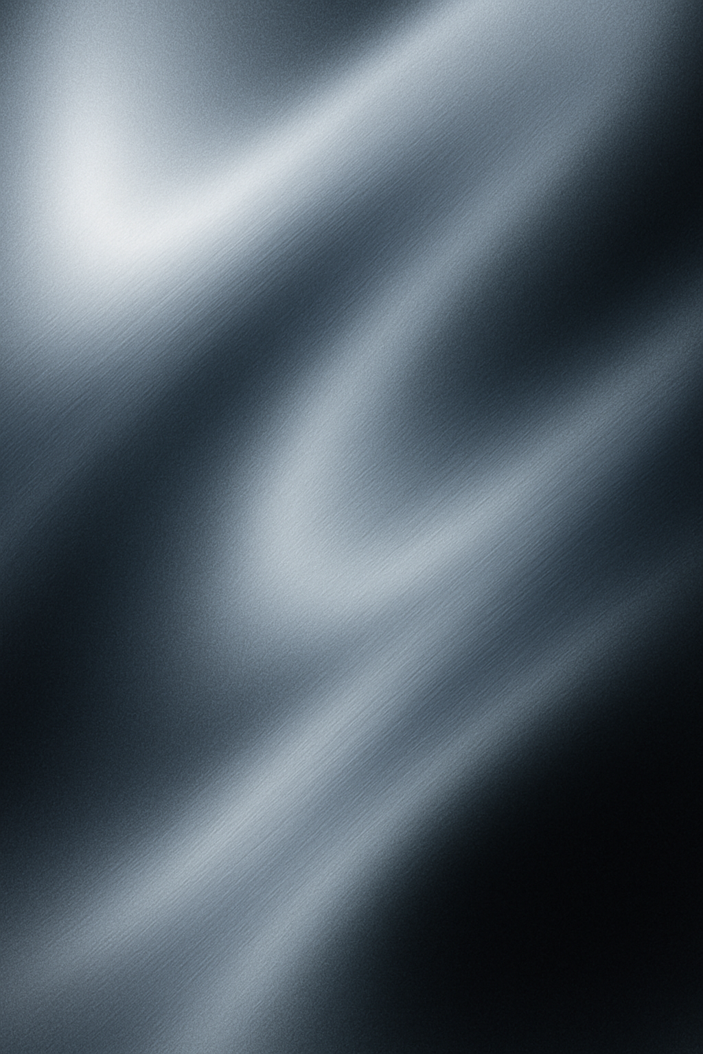 Design a high-resolution abstract background in portrait orientation with smooth, flowing gradients resembling brushed metal or soft light reflections. Use a monochromatic palette of silver, steel blue, and black, with soft blurred transitions to create a modern, glossy feel. Apply a subtle noise or grain texture for depth while keeping the composition minimal and immersive. The overall style should be sleek, futuristic, and elegant, providing clean negative space for app icons and UI elements.